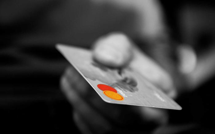 Credit card being held